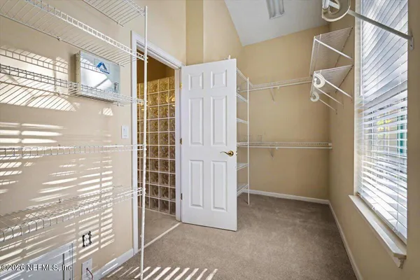 a room with cabinets and a wooden floor