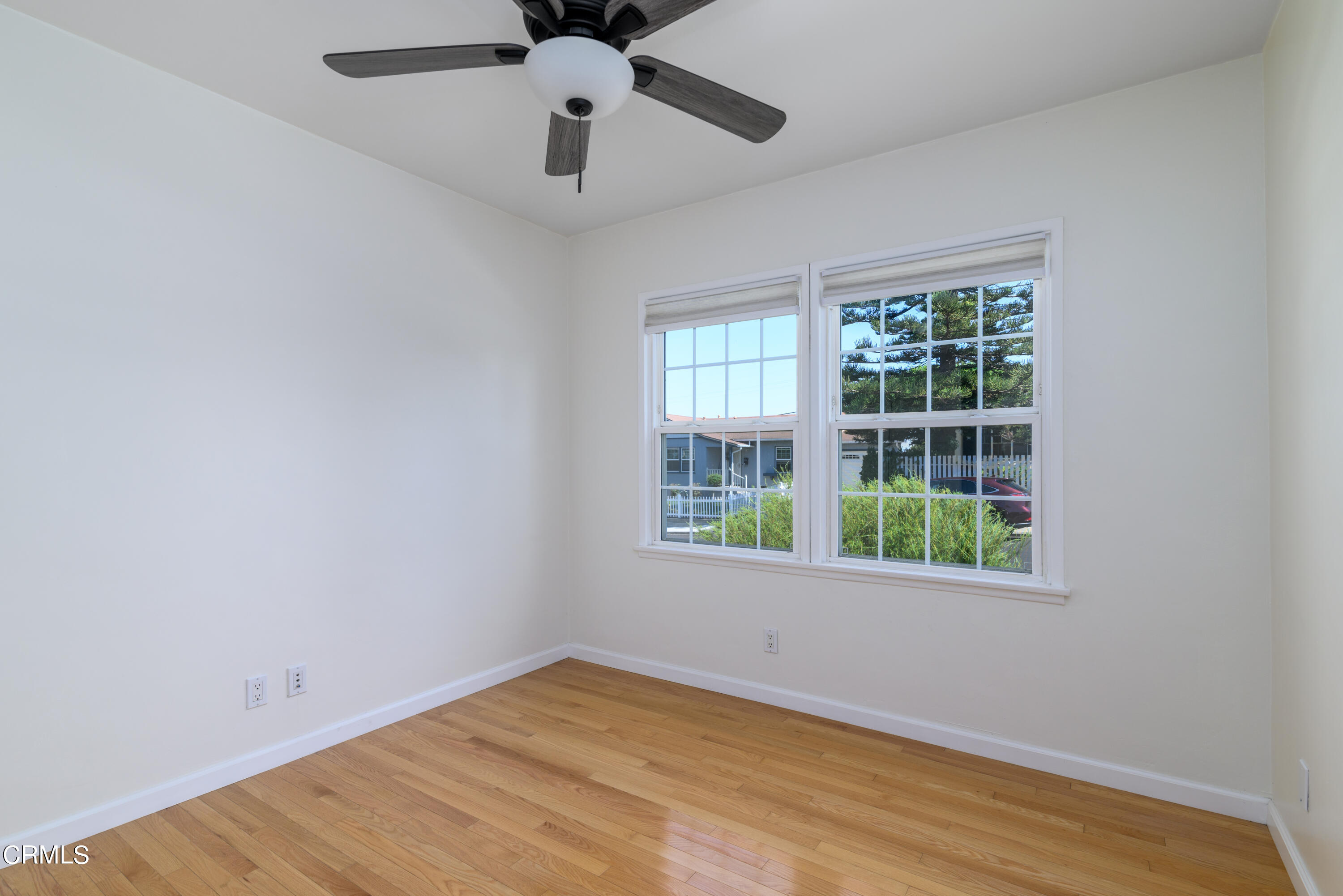 155 Cedar Drive Camarillo, CA 93010 - Photo 20 of 28 an empty room with a window and ceiling fan