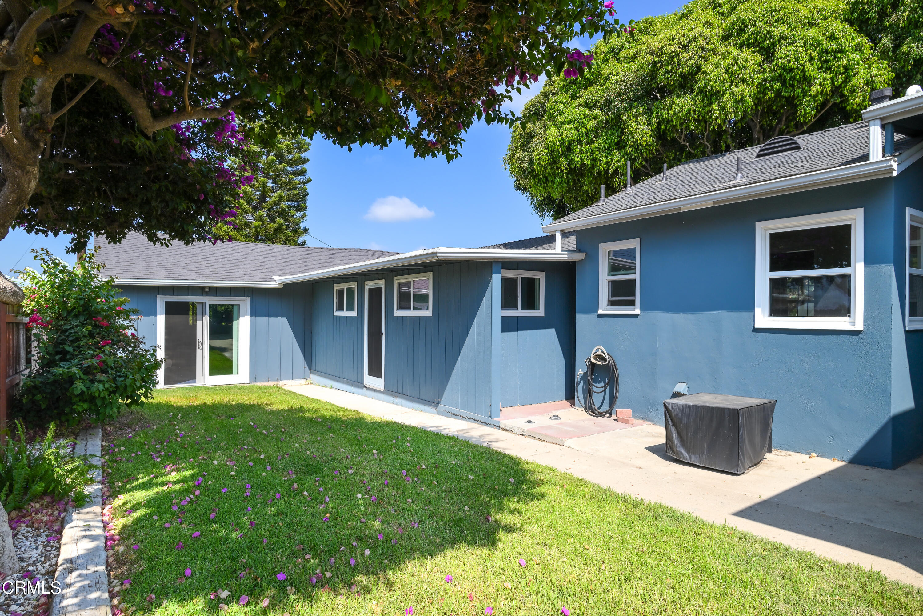 155 Cedar Drive Camarillo, CA 93010 - Photo 26 of 28 a backyard of a house with table and chairs