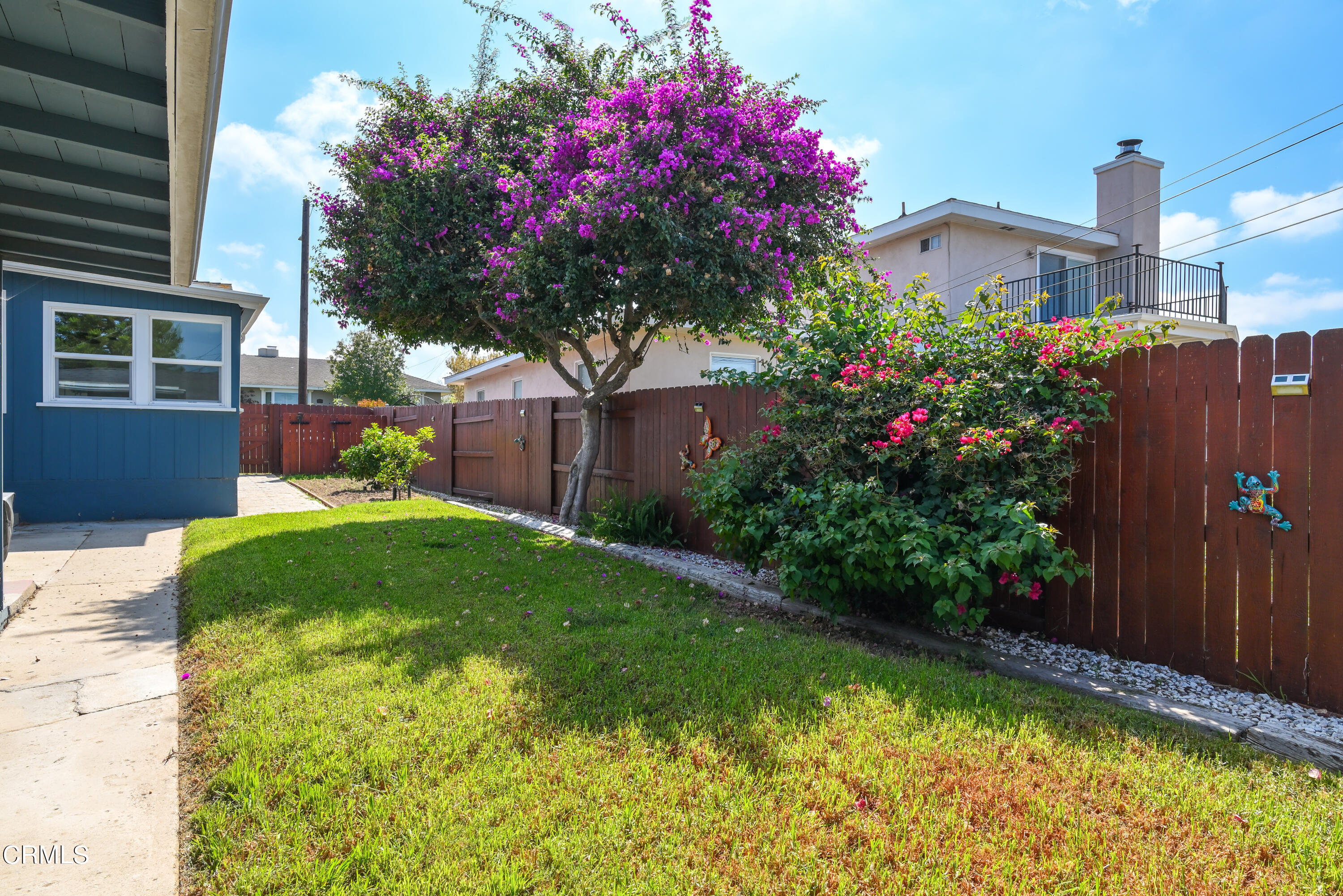 155 Cedar Drive Camarillo, CA 93010 - Photo 27 of 28 a front view of a house with a yard and fountain