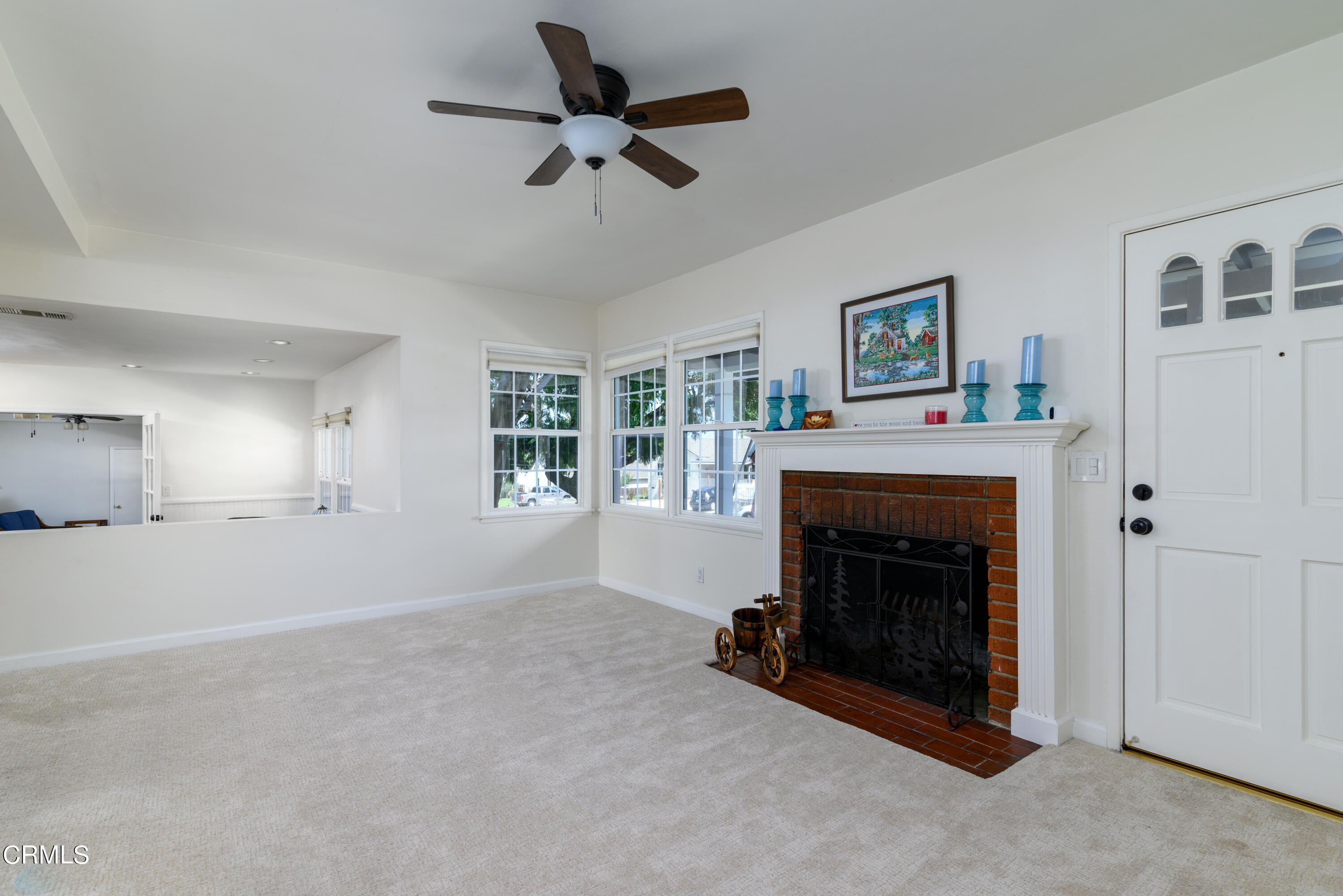 155 Cedar Drive Camarillo, CA 93010 - Photo 4 of 28 a living room with furniture and a fireplace