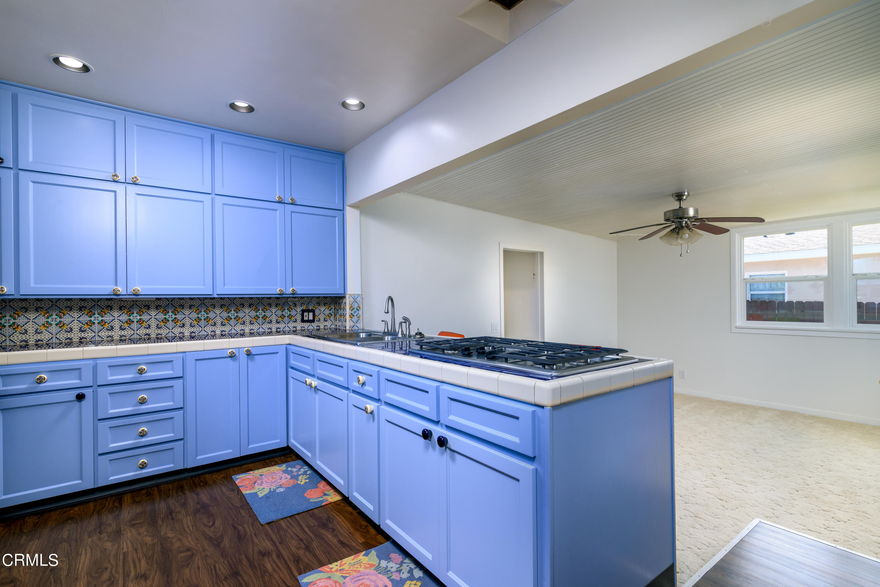 155 Cedar Drive Camarillo, CA 93010 - Photo 9 of 28 a kitchen with granite countertop a stove and cabinets