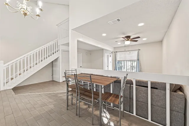 a view of kitchen with furniture wooden floor and window