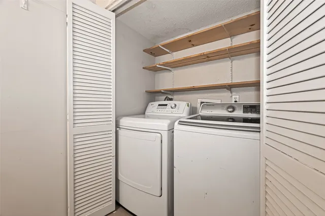 a view of garage and yard