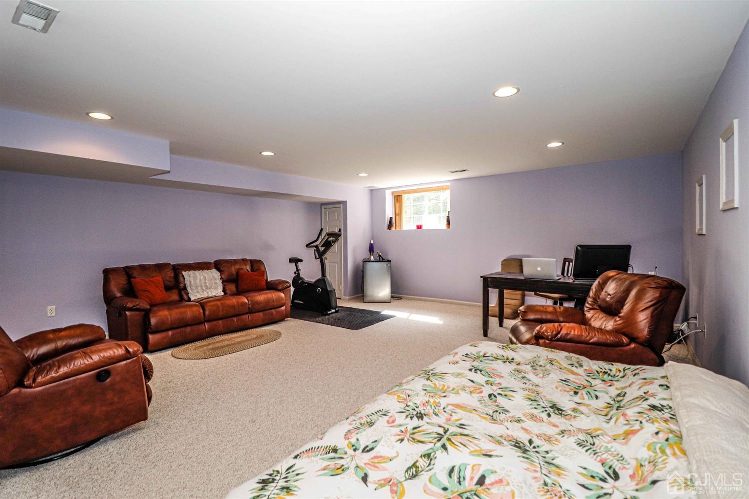 31 Harbor Bay Circle Old Bridge, NJ 08879 - Photo 14 of 36 a bedroom with furniture and a couch