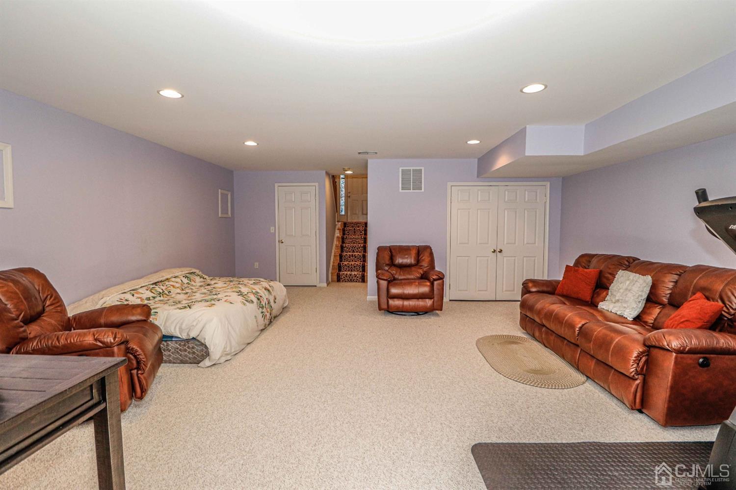 31 Harbor Bay Circle Old Bridge, NJ 08879 - Photo 15 of 36 a bedroom with furniture and a couch