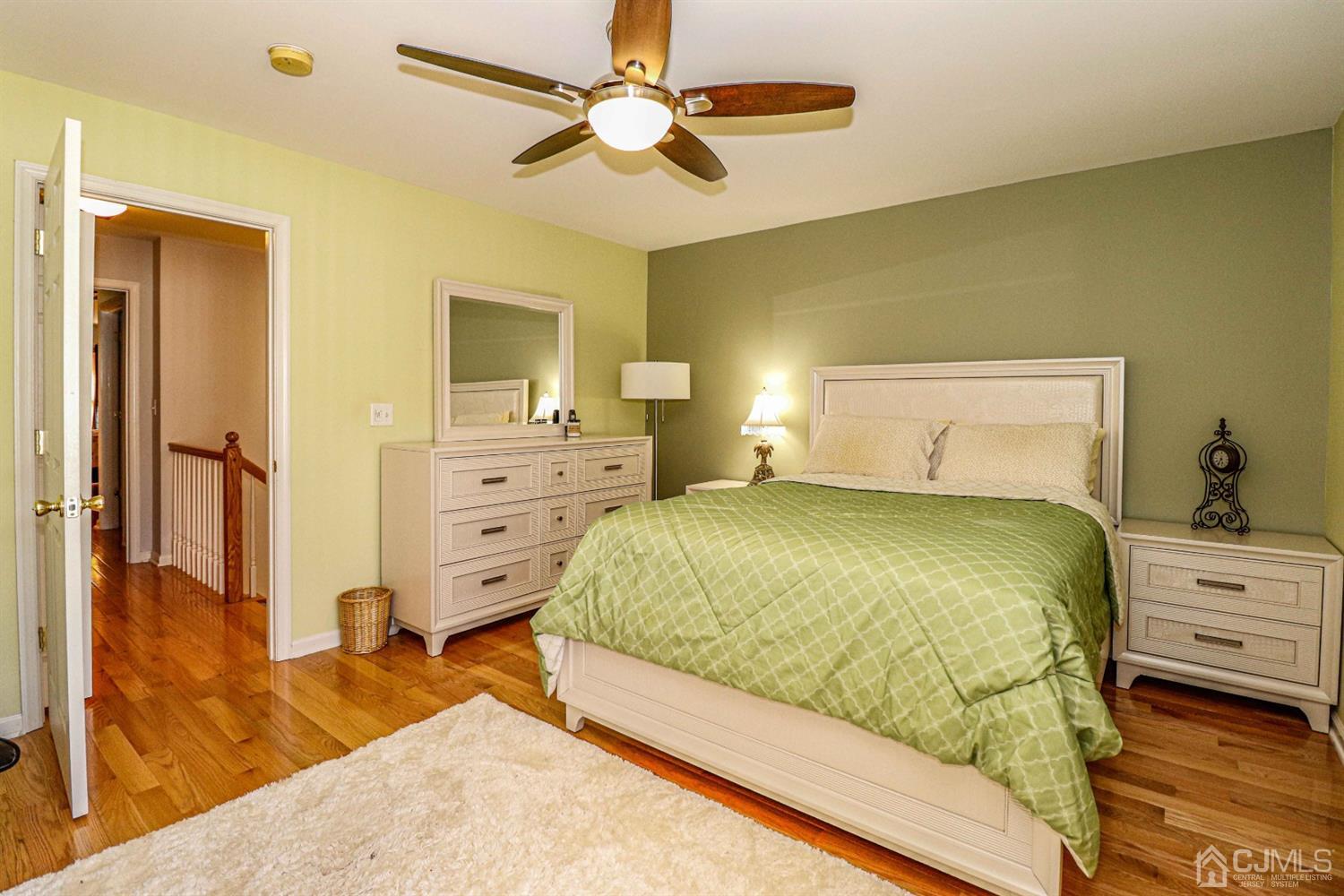 31 Harbor Bay Circle Old Bridge, NJ 08879 - Photo 28 of 36 a bedroom with a bed and a dresser