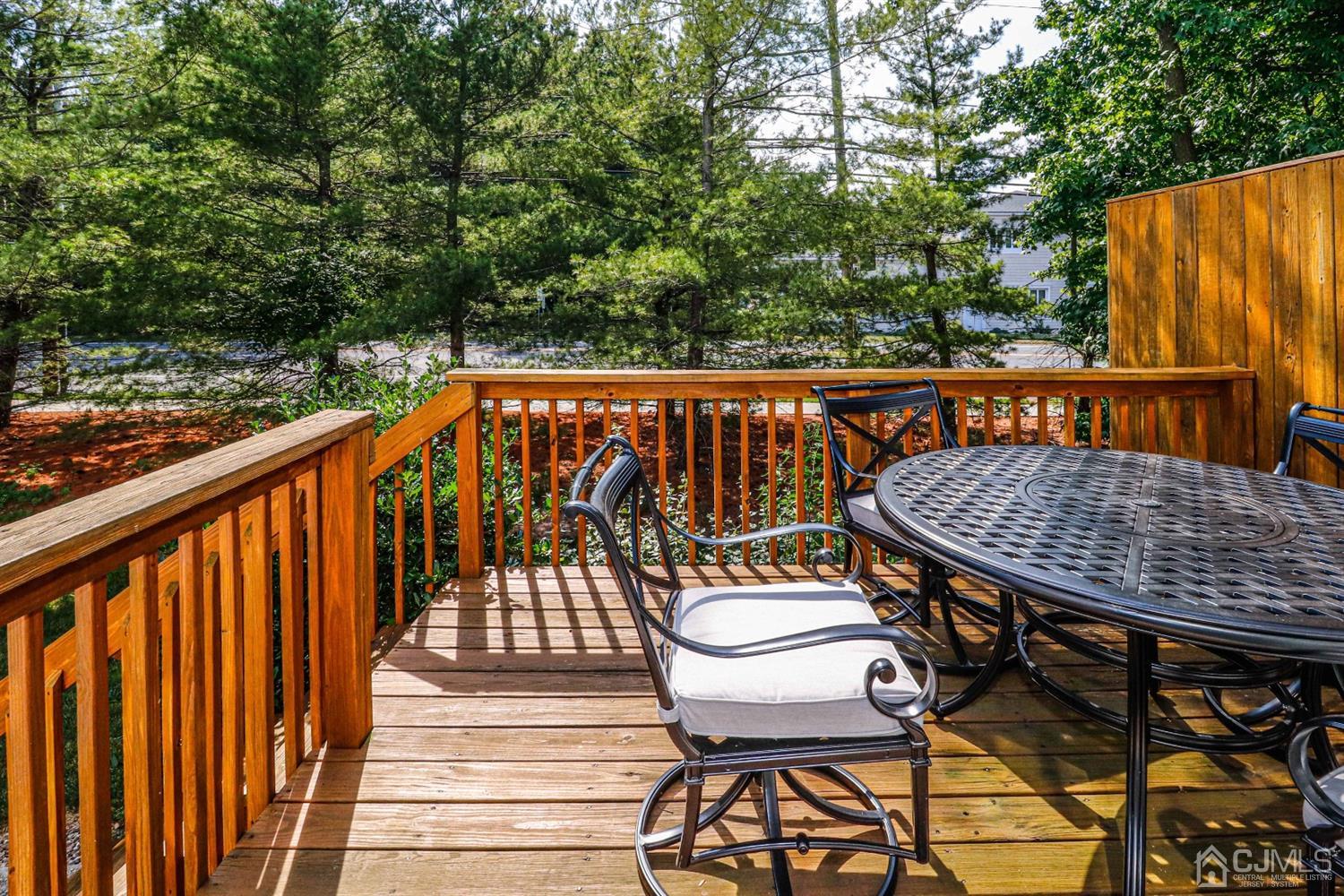 31 Harbor Bay Circle Old Bridge, NJ 08879 - Photo 30 of 36 a view of balcony with wooden floor and outdoor seating