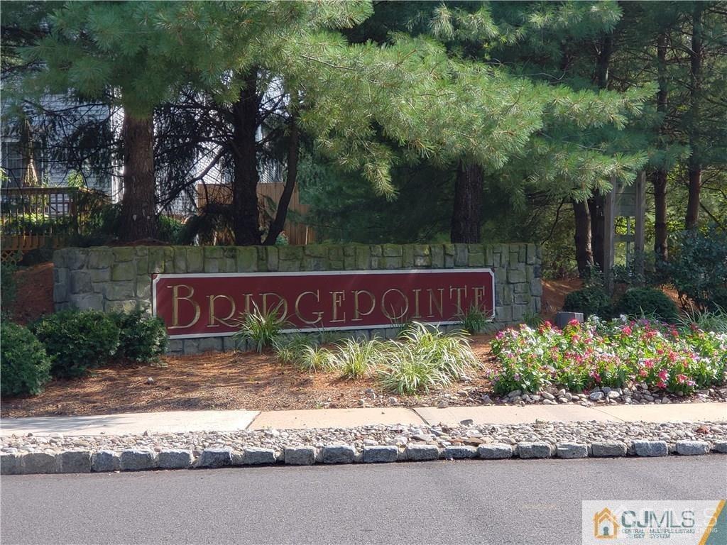 31 Harbor Bay Circle Old Bridge, NJ 08879 - Photo 33 of 36 a sign that is sitting in front of a house