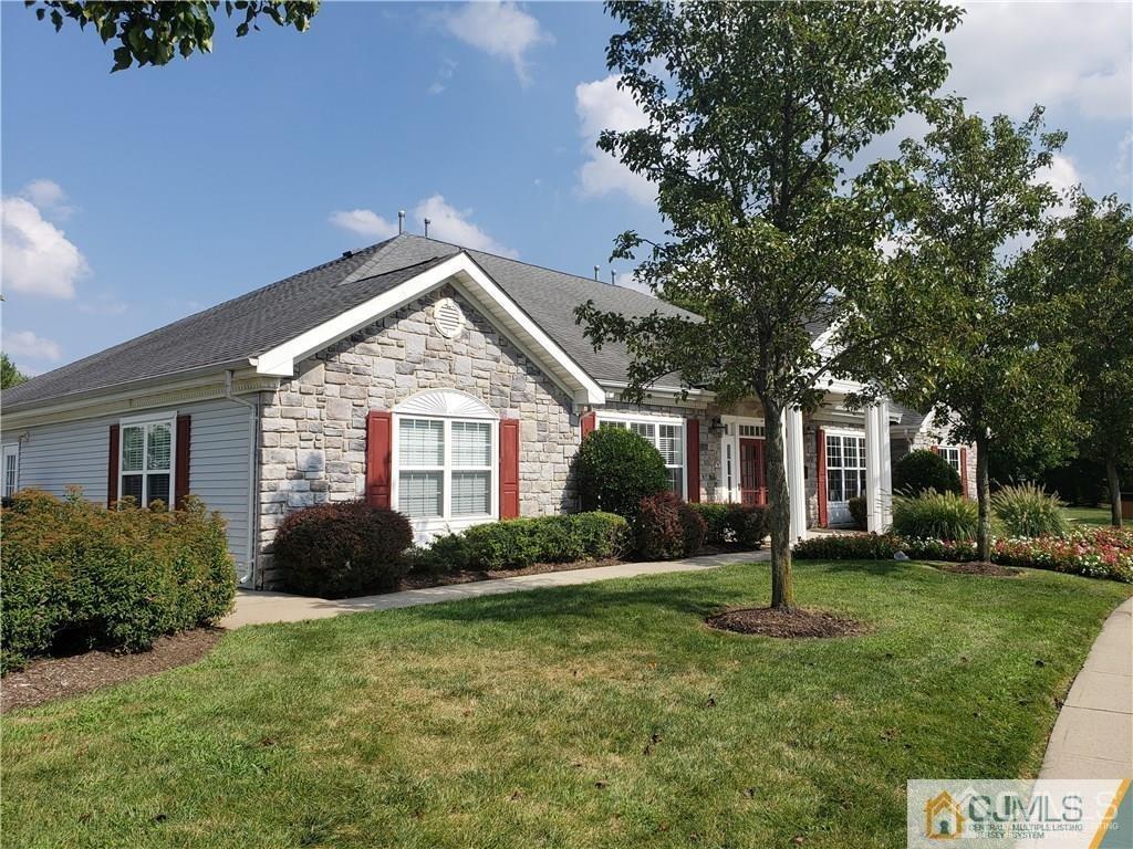 31 Harbor Bay Circle Old Bridge, NJ 08879 - Photo 34 of 36 a front view of a house with garden