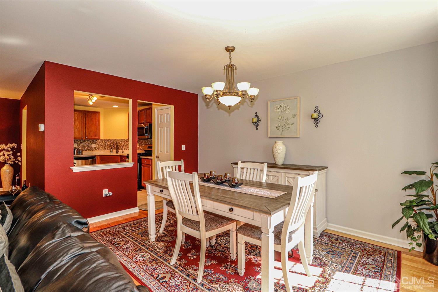 31 Harbor Bay Circle Old Bridge, NJ 08879 - Photo 6 of 36 a view of a dining room with furniture and wooden floor