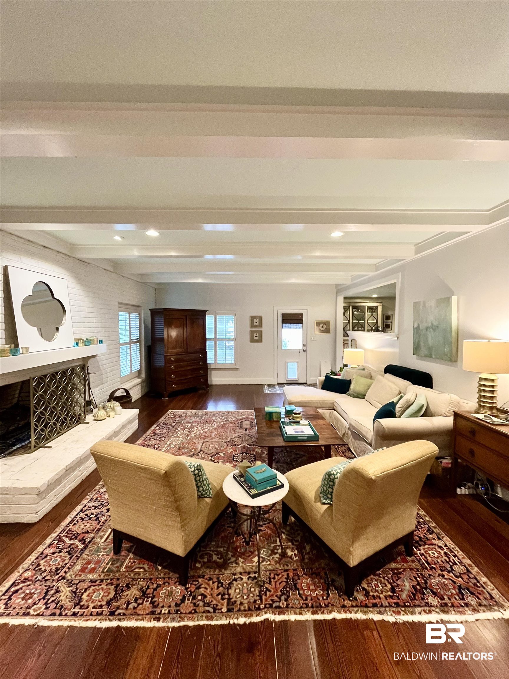 451 Ridgelawn Drive West Mobile, AL 36608 - Photo 22 of 41 Living room featuring beamed ceiling and wood finished floors