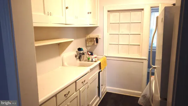 a view of a sink and a window