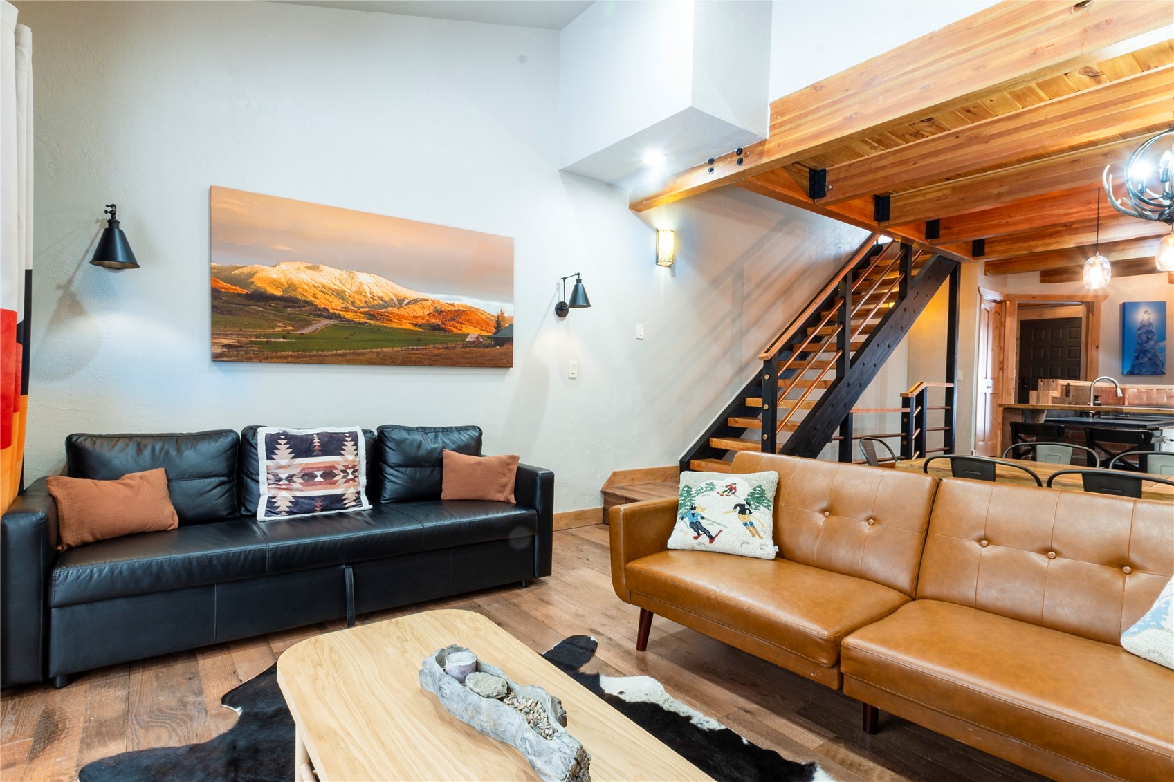 2739 Burgess Creek Road, Unit 10 Steamboat Springs, CO 80487 - Photo 17 of 46 a living room with furniture and stairs