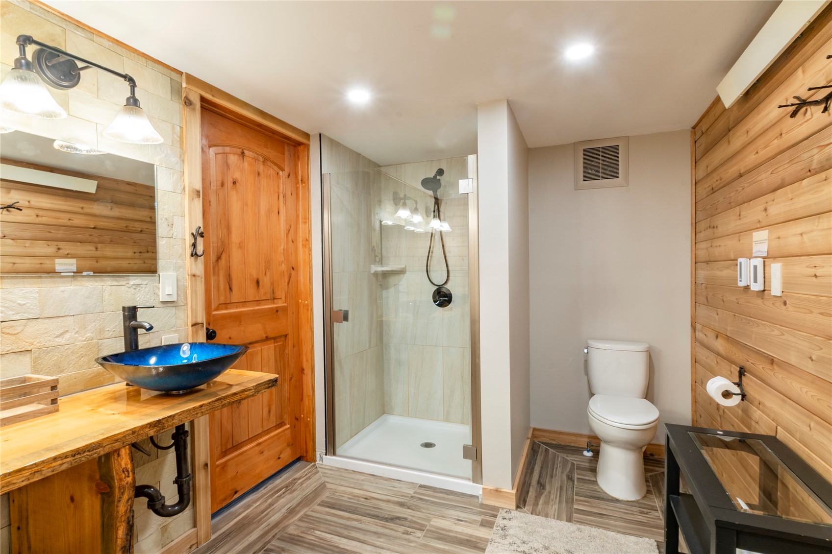 2739 Burgess Creek Road, Unit 10 Steamboat Springs, CO 80487 - Photo 31 of 46 a bathroom with a sink a toilet and shower
