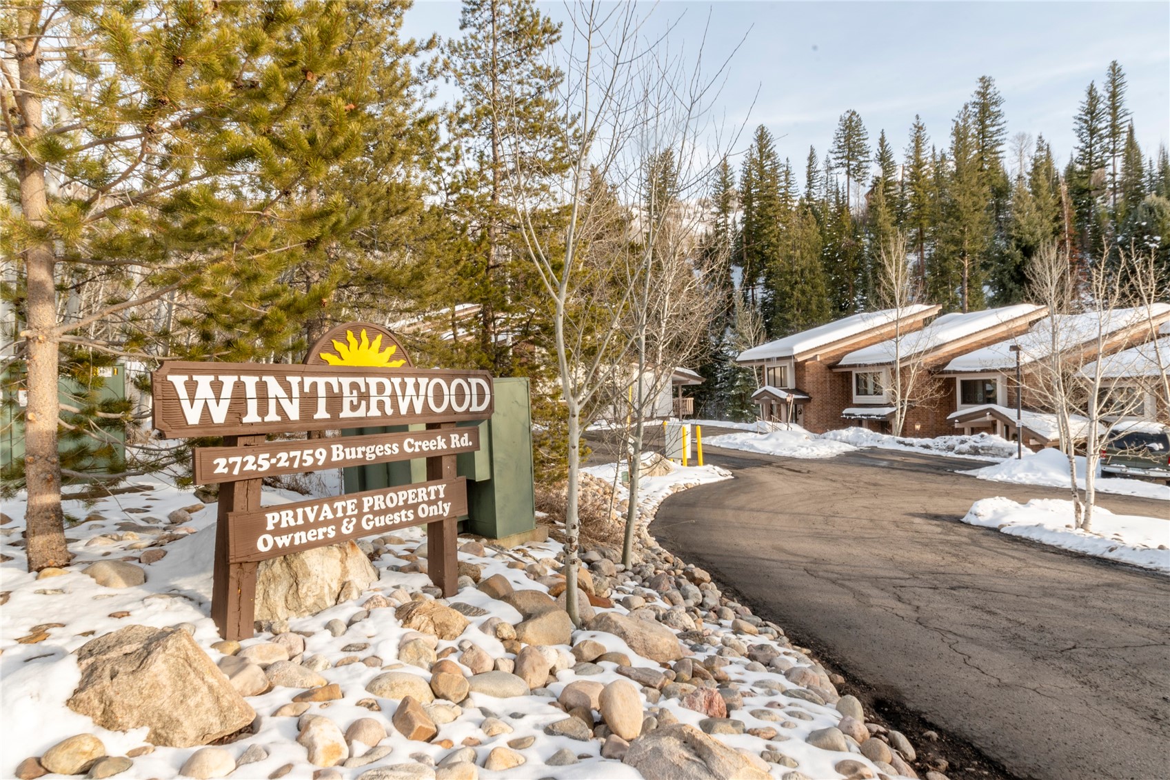 2739 Burgess Creek Road, Unit 10 Steamboat Springs, CO 80487 - Photo 33 of 46 a view of a house with yard and sitting area