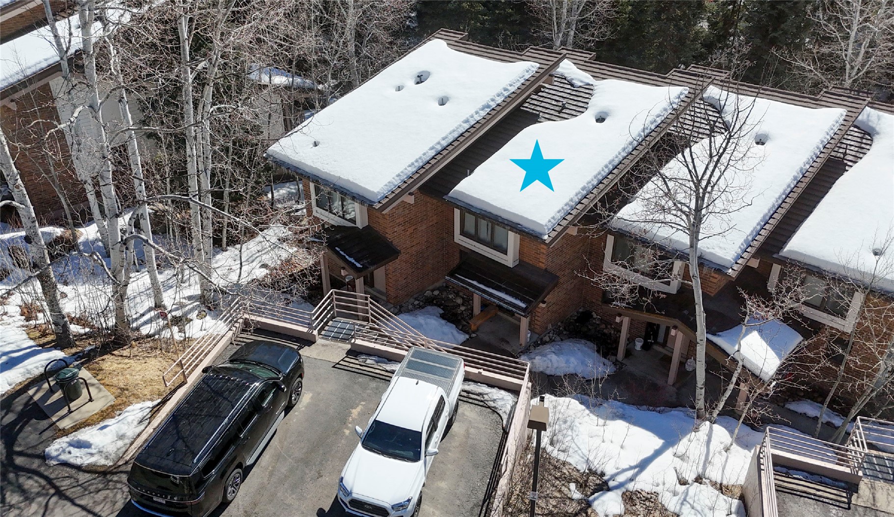 2739 Burgess Creek Road, Unit 10 Steamboat Springs, CO 80487 - Photo 39 of 46 a roof deck with couch and chairs