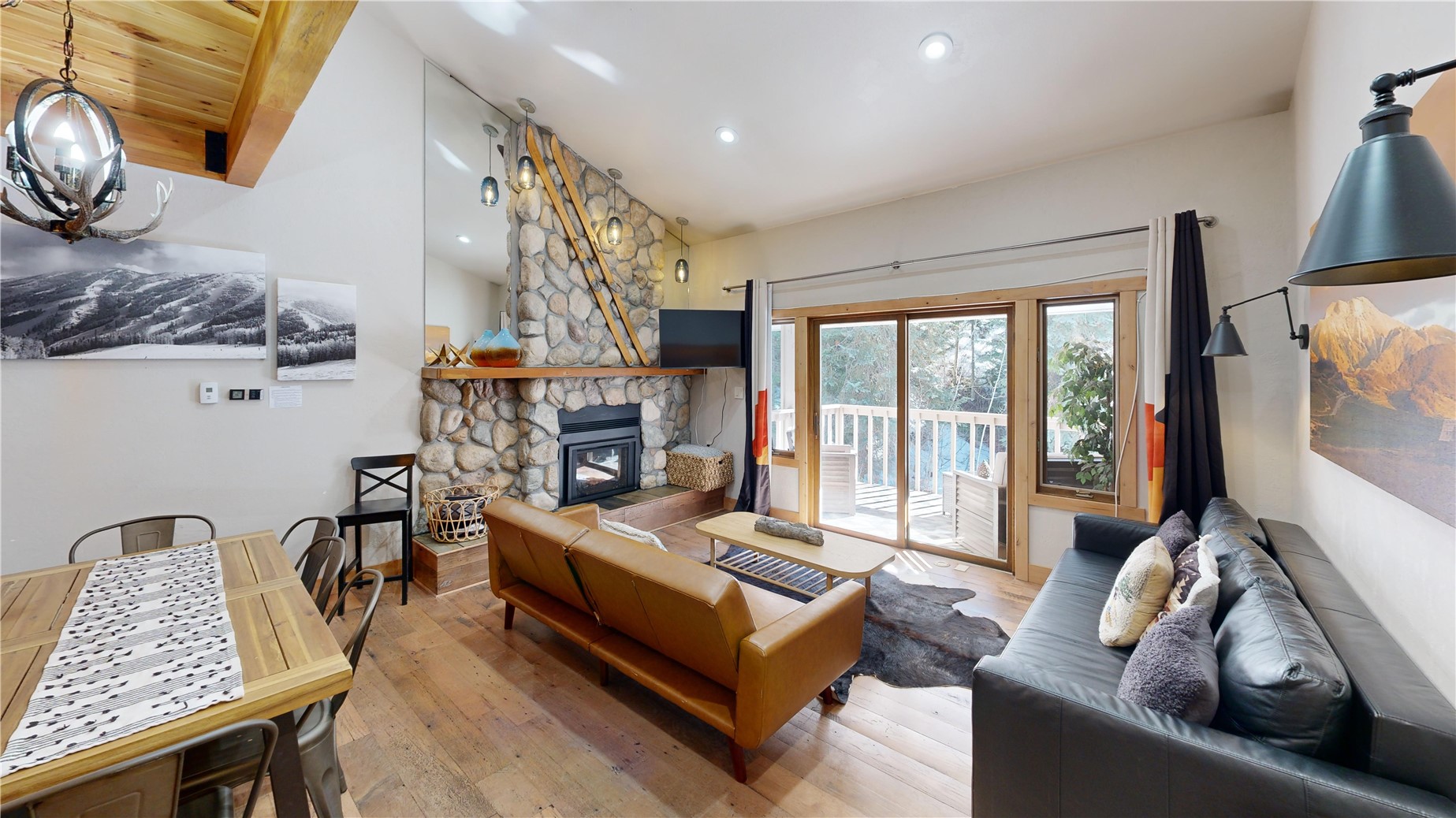 2739 Burgess Creek Road, Unit 10 Steamboat Springs, CO 80487 - Photo 10 of 46 a living room with furniture and a fireplace