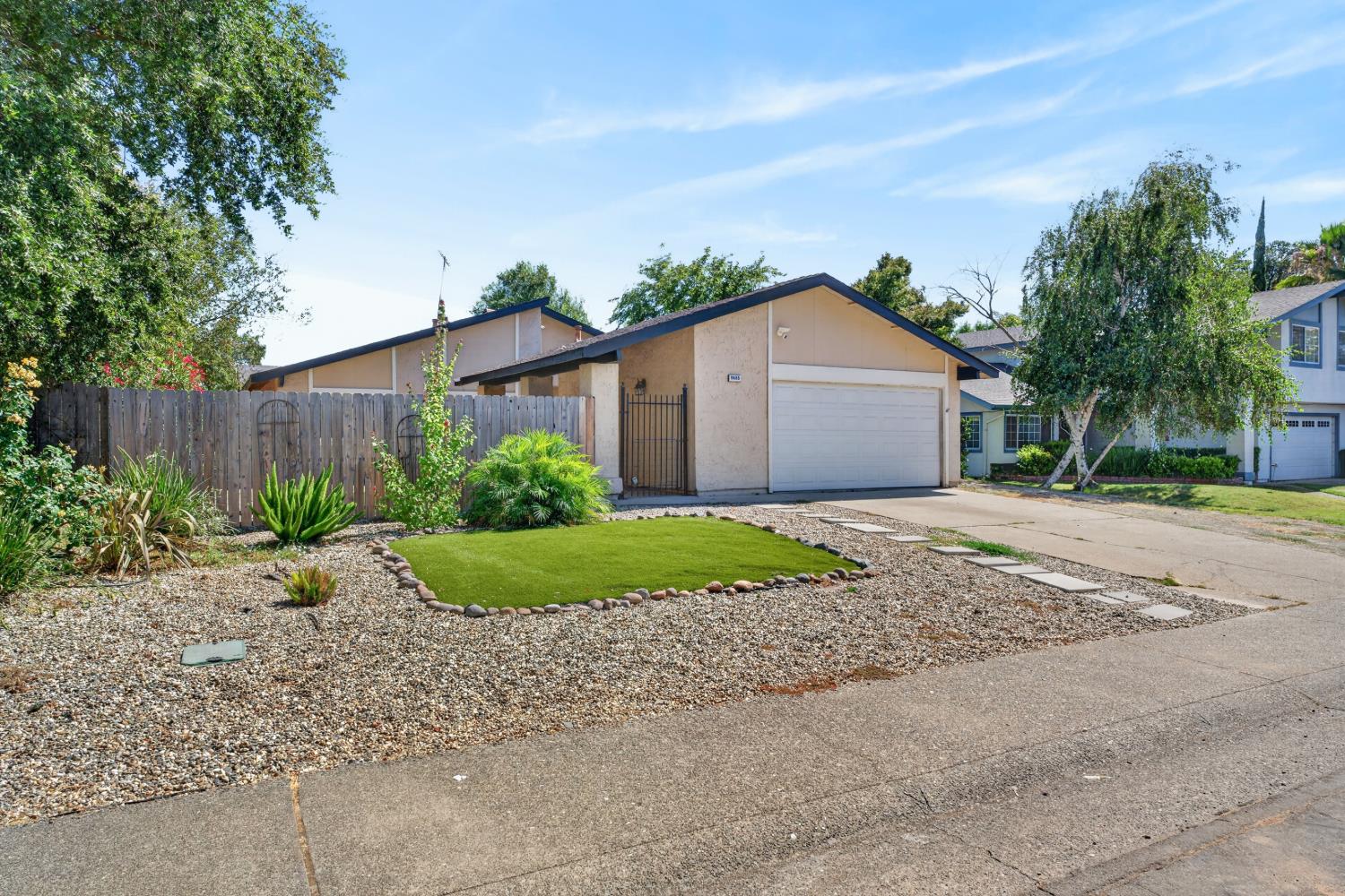 8488 Old Ranch Road Orangevale, CA 95662 - Photo 3 of 51 a front view of a house with garden