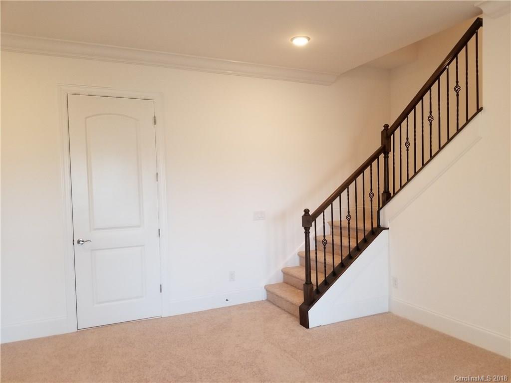 2227 Watermark Point Place, Unit 77 Fort Mill, SC 29708 - Photo 14 of 19 a view of an entryway with wooden floor
