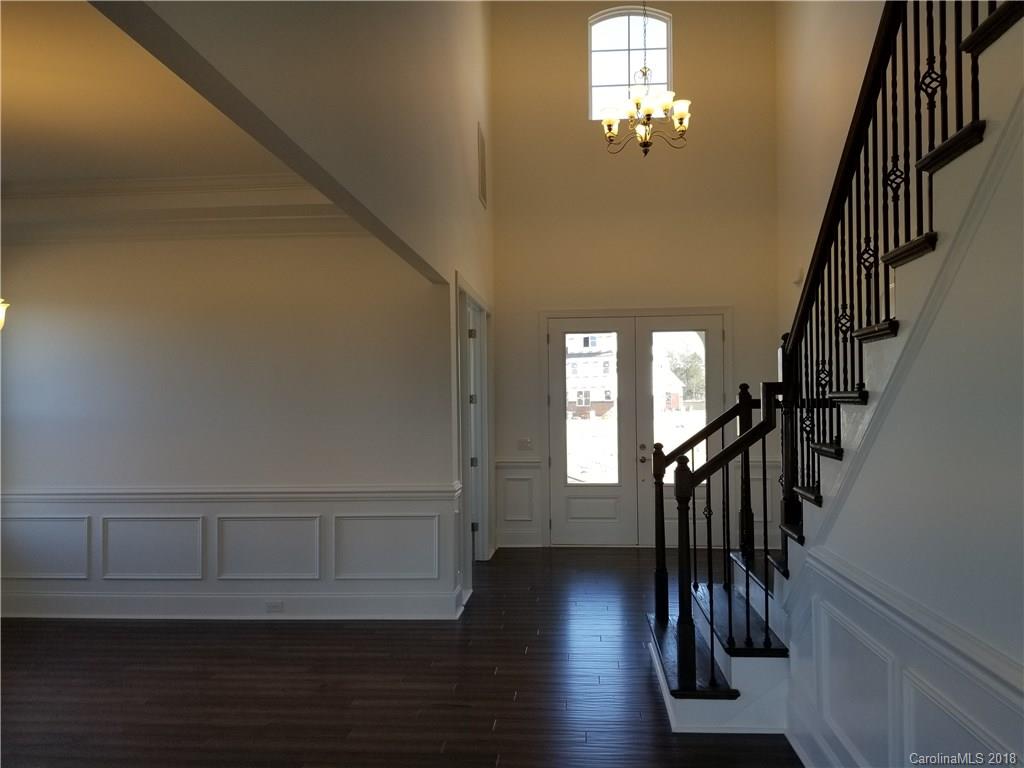 2227 Watermark Point Place, Unit 77 Fort Mill, SC 29708 - Photo 3 of 19 a view of entryway with wooden floor
