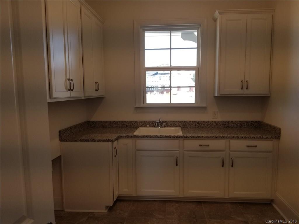 2227 Watermark Point Place, Unit 77 Fort Mill, SC 29708 - Photo 8 of 19 a view of cabinets and window