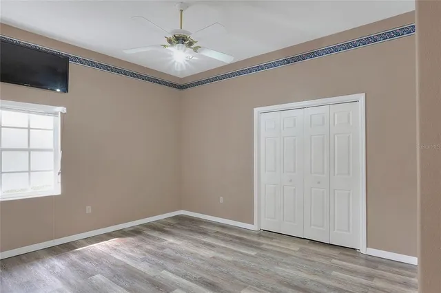 a lobby with furniture and a potted plant