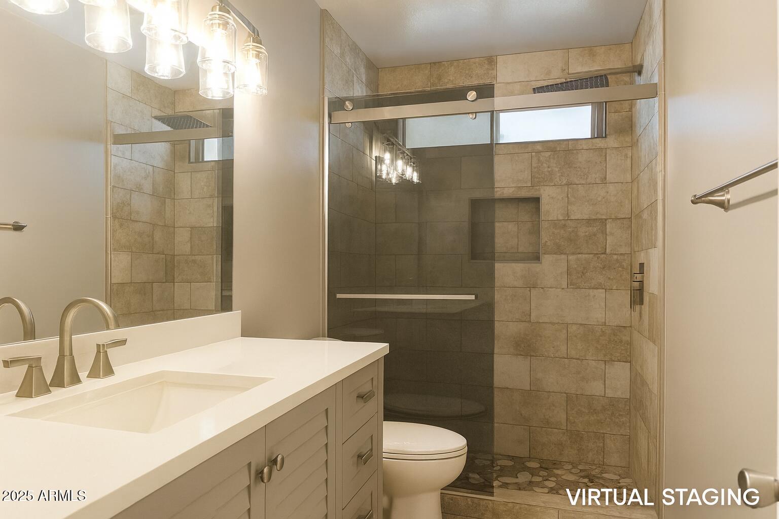 1708 West Cortez Circle Chandler, AZ 85224 - Photo 8 of 22 a bathroom with a sink a toilet and shower