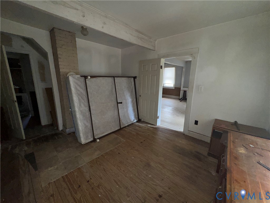 303 Purdy Road Emporia, VA 23847 - Photo 13 of 18 a view of a hallway with wooden floor
