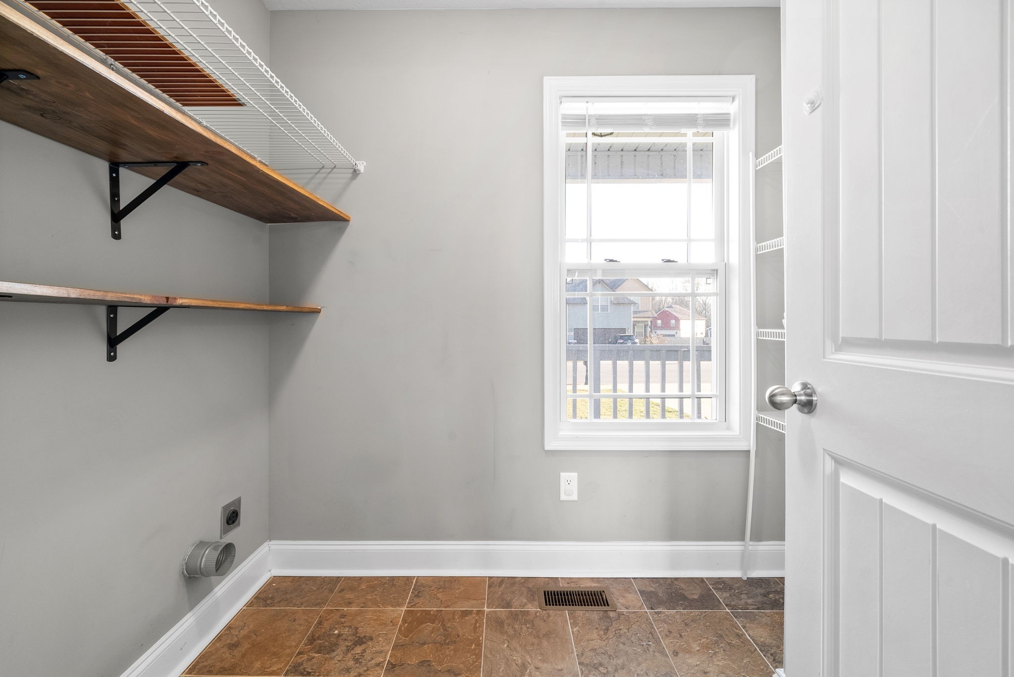 1868 Rains Road Clarksville, TN 37042 - Photo 18 of 39 a view of a room that has a window in it