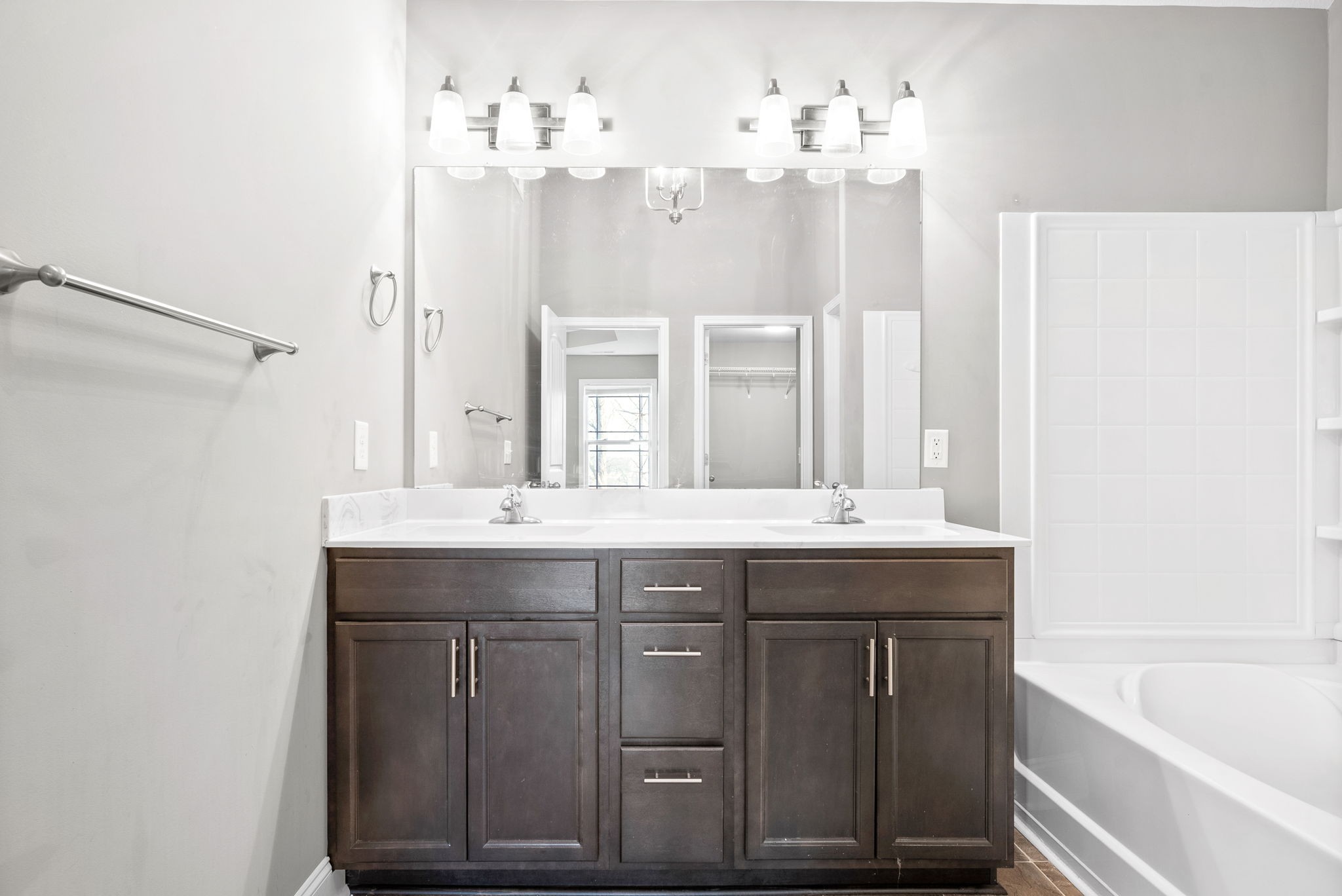 1868 Rains Road Clarksville, TN 37042 - Photo 22 of 39 a bathroom with a sink vanity and a mirror