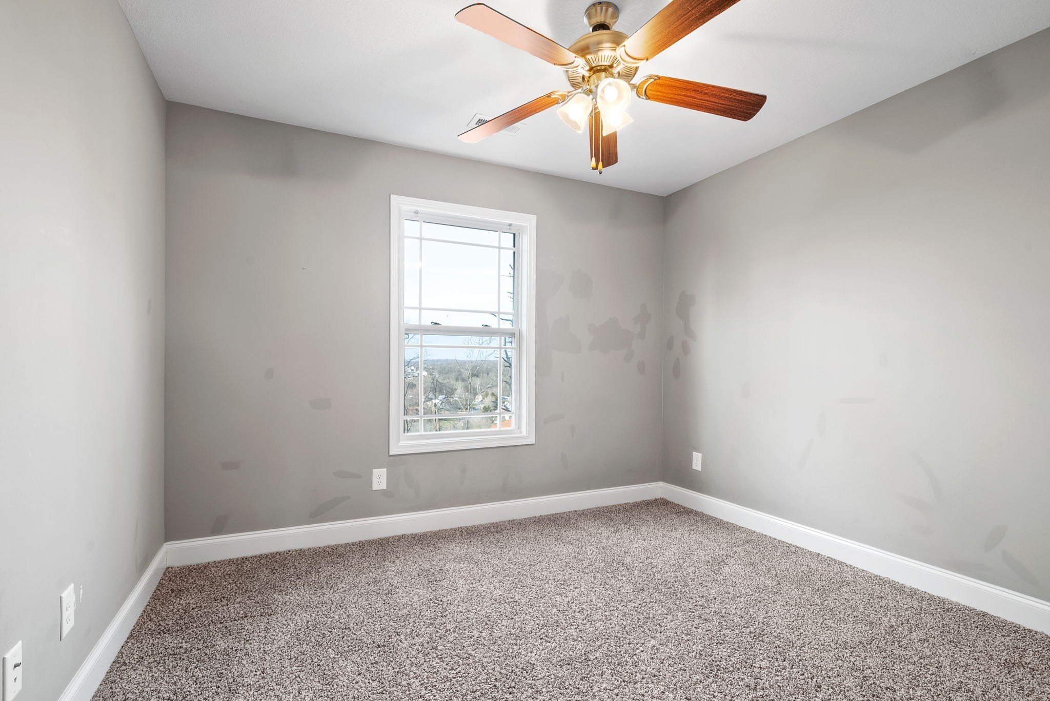 1868 Rains Road Clarksville, TN 37042 - Photo 29 of 39 an empty room with a window and a fan