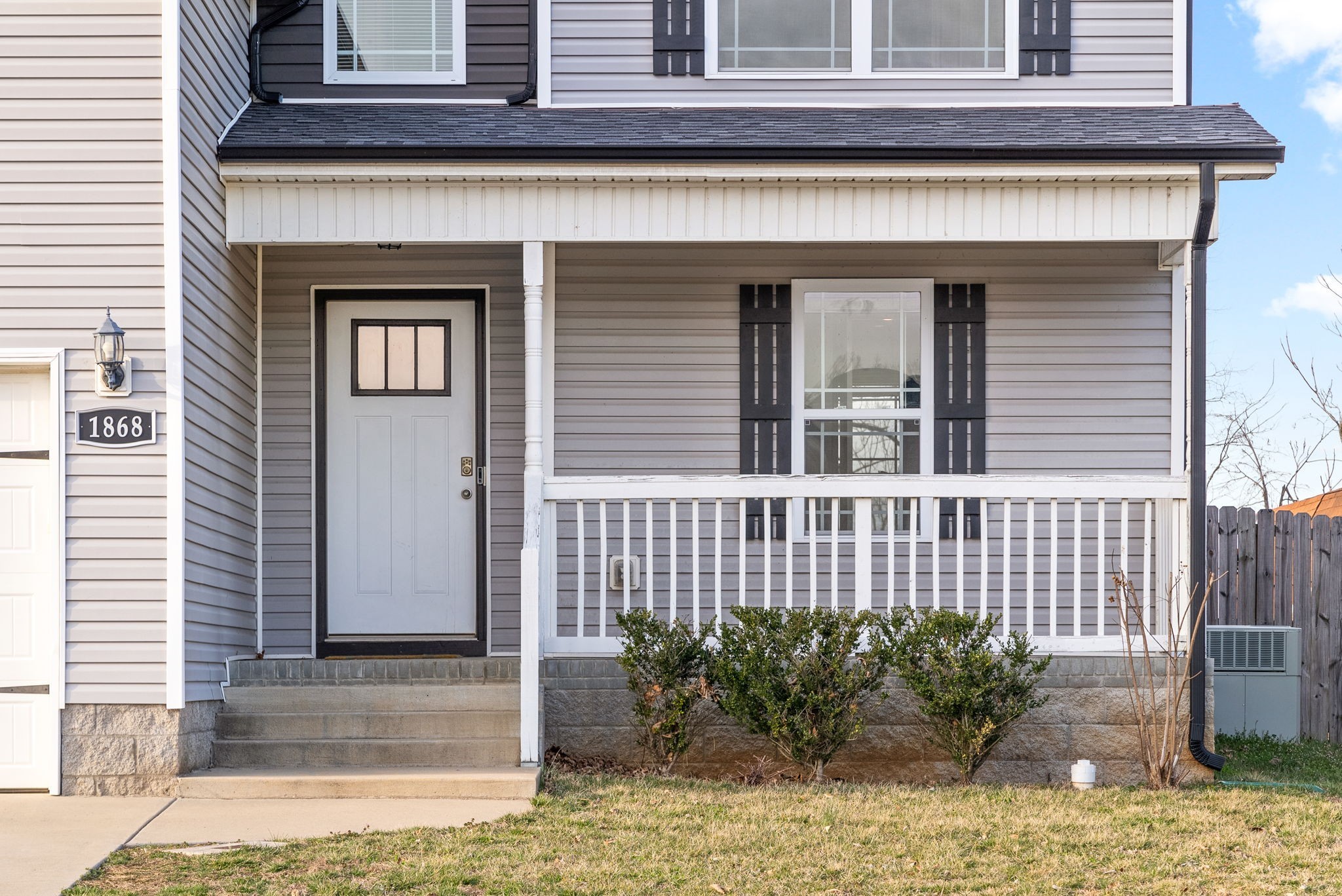 1868 Rains Road Clarksville, TN 37042 - Photo 5 of 39 a front view of a house with a garden