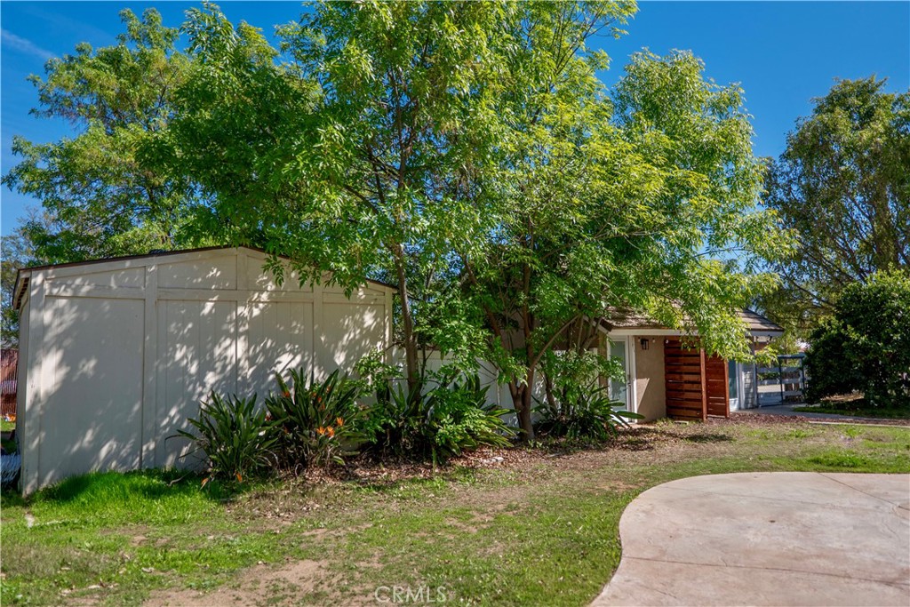 16630 Arabian Avenue Riverside, CA 92504 - Photo 29 of 42 front view of a house with a yard