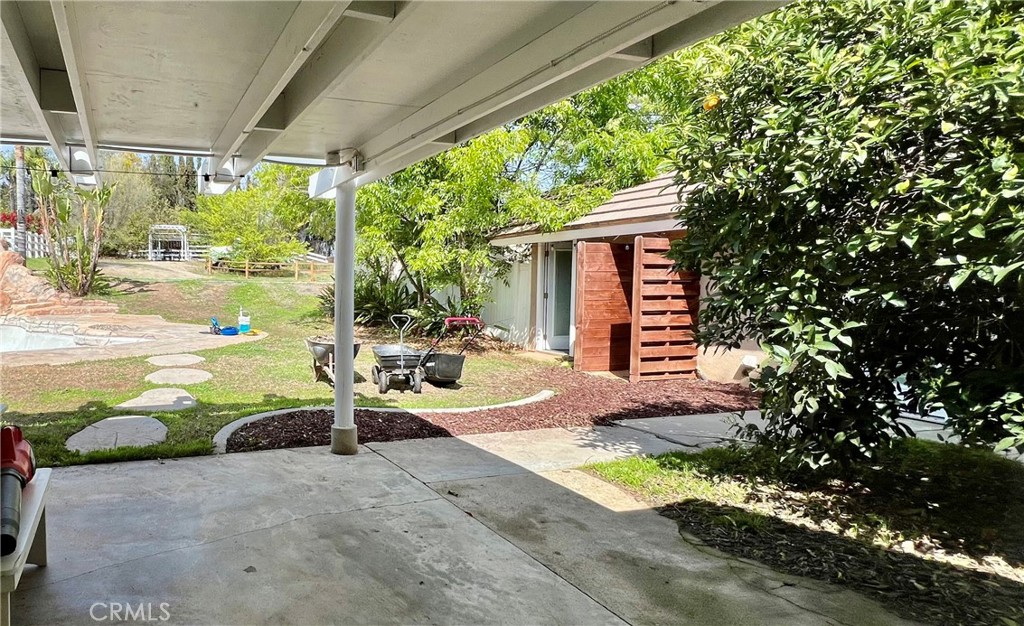 16630 Arabian Avenue Riverside, CA 92504 - Photo 34 of 42 a view of backyard with outdoor seating and plants