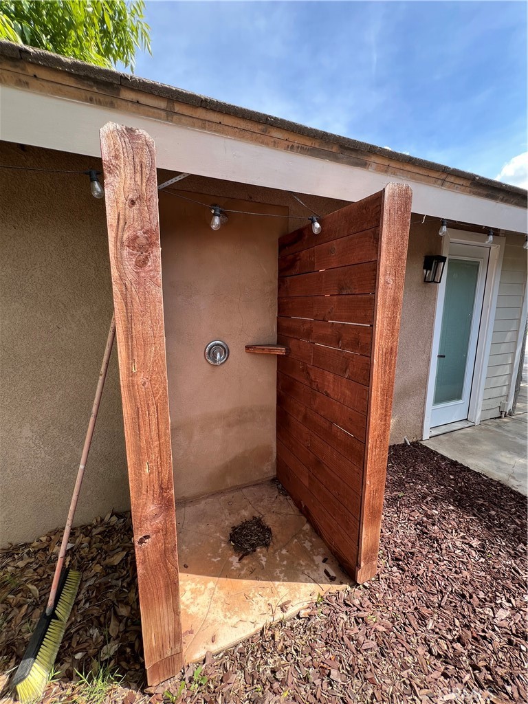 16630 Arabian Avenue Riverside, CA 92504 - Photo 35 of 42 a bathroom with a shower