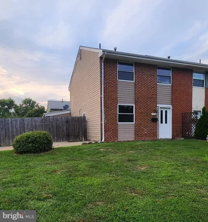 a view of a back yard of the house