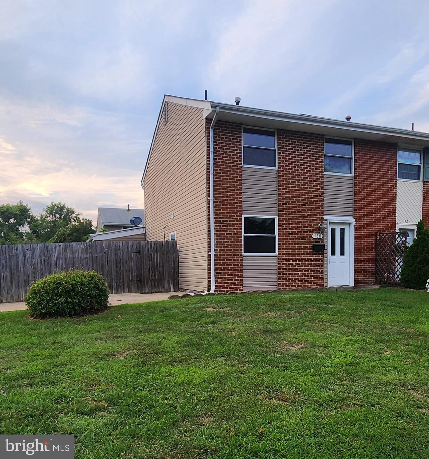 150 Dunlap Road Pasadena, MD 21122 - Photo 1 of 24 a view of a back yard of the house