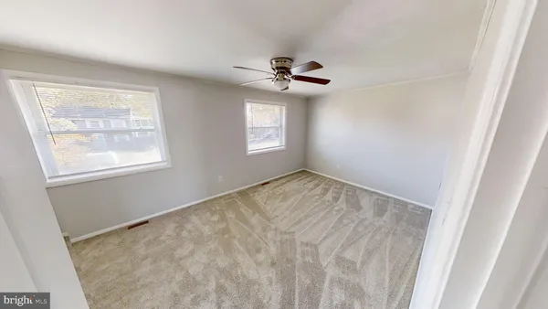 a view of empty room with a window