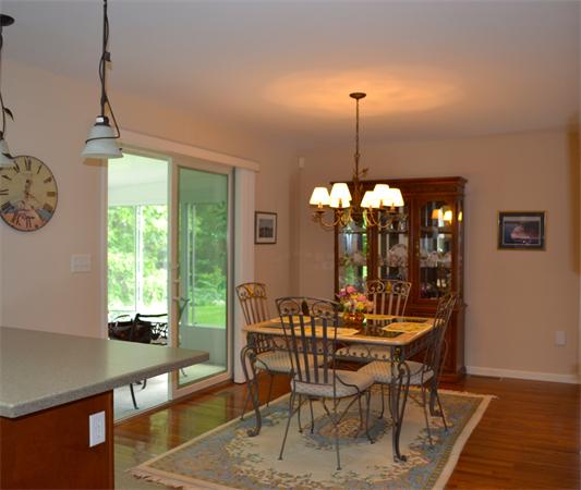 27 Benjaman Drive, Unit 27 Rochester, MA 02770 - Photo 7 of 22 a dining room with furniture and window