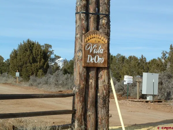 a street sign on a pole on a street
