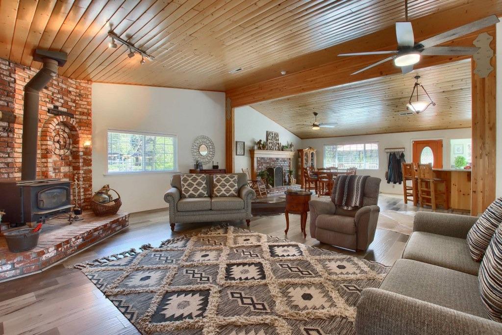 50537 Cedar Valley Drive Oakhurst, CA 93644 - Photo 13 of 59 a living room with furniture and a window