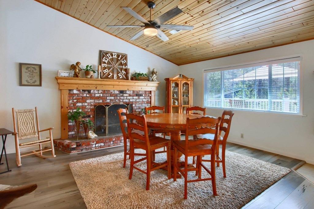 50537 Cedar Valley Drive Oakhurst, CA 93644 - Photo 14 of 59 a view of a dining room with furniture
