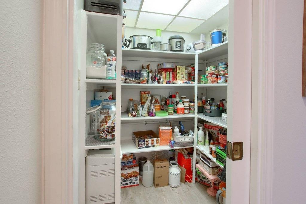 50537 Cedar Valley Drive Oakhurst, CA 93644 - Photo 23 of 59 a room with storage and utility room