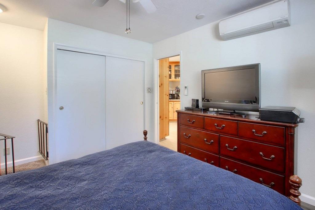 50537 Cedar Valley Drive Oakhurst, CA 93644 - Photo 26 of 59 a room with furniture and flat screen tv