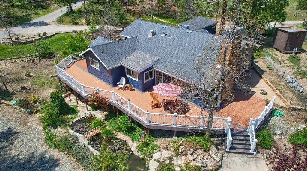 50537 Cedar Valley Drive Oakhurst, CA 93644 - Photo 37 of 59 an aerial view of a house
