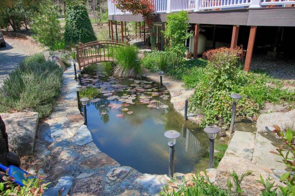 50537 Cedar Valley Drive Oakhurst, CA 93644 - Photo 44 of 59 a view of a water fountain in front of house