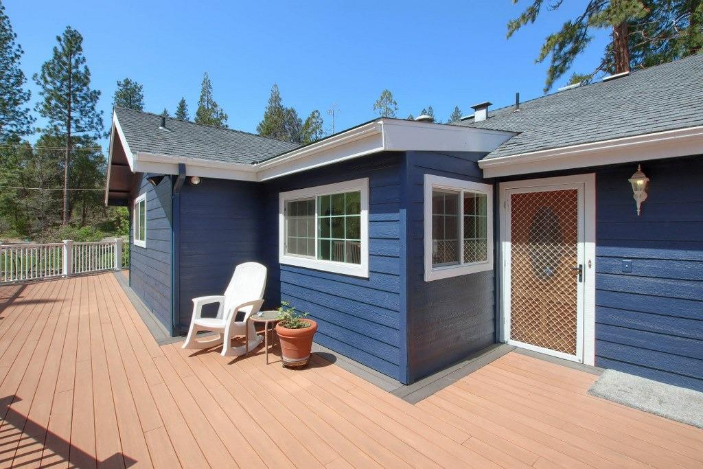 50537 Cedar Valley Drive Oakhurst, CA 93644 - Photo 6 of 59 a house view with a seating space