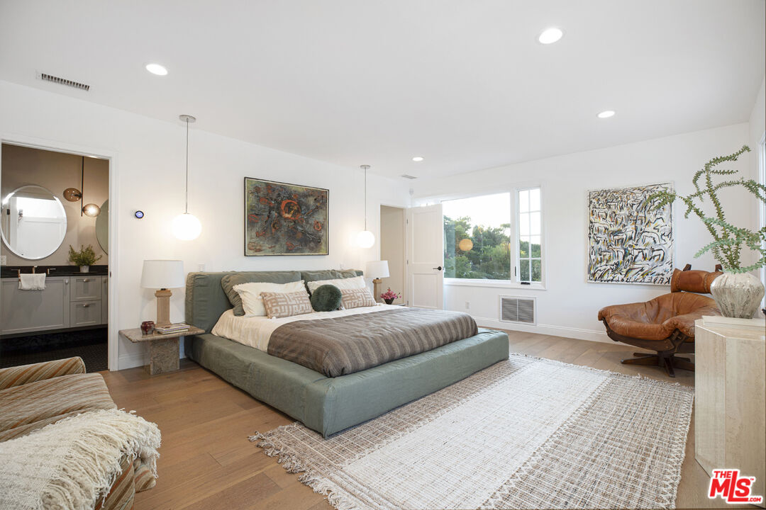 1411 Wellesley Drive Glendale, CA 91205 - Photo 11 of 32 a spacious bedroom with a bed and window