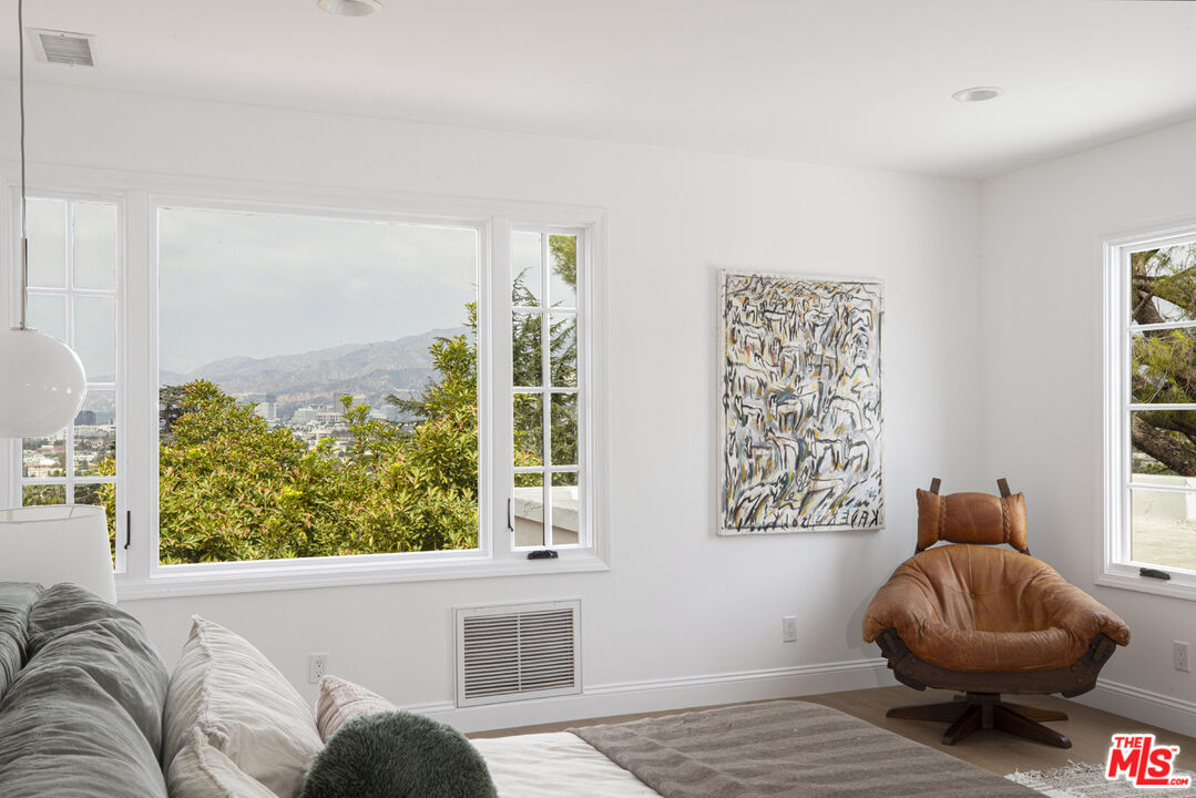 1411 Wellesley Drive Glendale, CA 91205 - Photo 12 of 32 a living room with furniture and a rug
